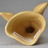 Buff coloured pottery stirrup cup, circa 1820