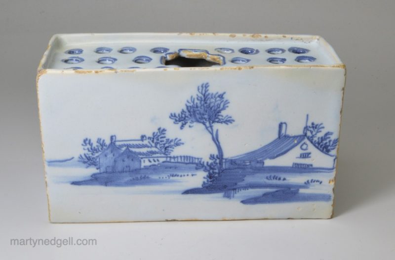 Liverpool delft flower brick painted blue, circa 1750