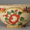 English creamware pottery 'Chintz' tea bowl and saucer, circa 1770