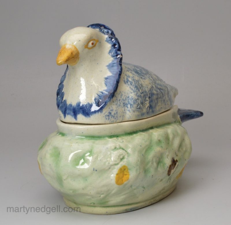 Pearlware pottery dove tureen decorated with colours under the glaze, circa 1800