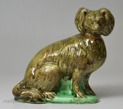 Pearlware pottery Spaniel decorated with colours under the glaze, circa 1790