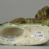 Pearlware pottery Spaniel decorated with colours under the glaze, circa 1790