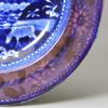 Pearlware pottery cup plate decorated with a blue transfer print and lustre border, circa 1820