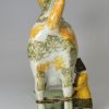 Prattware pottery cow creamer with hobbled legs, circa 1820