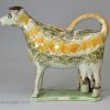 Prattware pottery cow creamer with hobbled legs, circa 1820