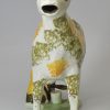 Prattware pottery cow creamer with hobbled legs, circa 1820