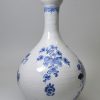 Dublin or Liverpool delft bottle painted in blue with the war bonnet pattern, circa 1750