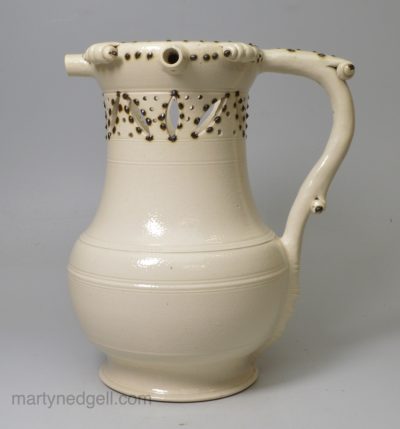 Staffordshire white saltglaze stoneware puzzle jug, circa 1750