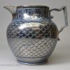 Blue coloured pottery jug decorated with silver resist lustre, circa 1820