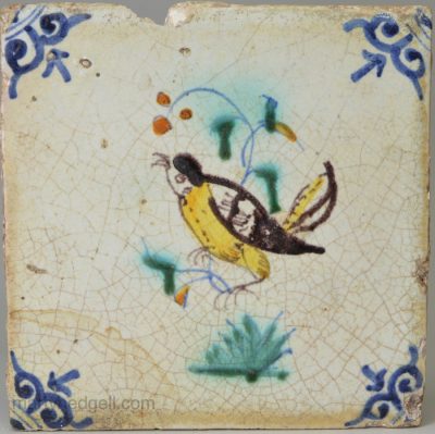 Dutch Delft polychrome bird tile, circa 1700