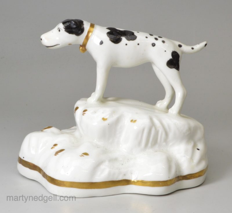 Staffordshire porcelain Dalmatian on a rocky base, circa 1840