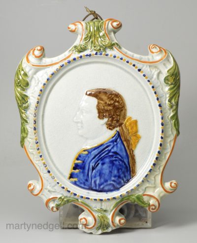 Prattware pottery plaque moulded with George III, circa 1790