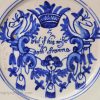 London delft Merryman plate '#5 But if his wife doth frowne', circa 1690