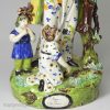 Large Staffordshire pearlware pottery figure of the Widow and orphans, circa 1820