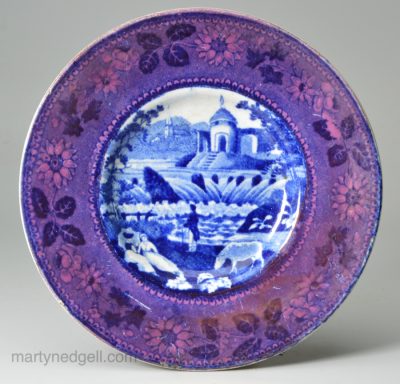 Pearlware pottery cup plate decorated with blue transfer and pink lustre border, circa 1820