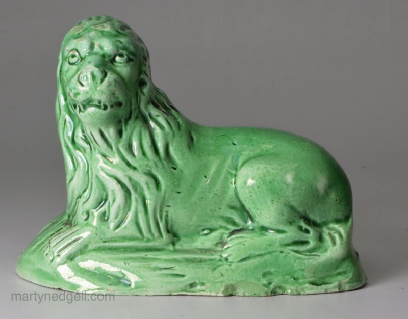 Creamware green glazed model of a lion, circa 1790