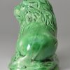 Creamware green glazed model of a lion, circa 1790