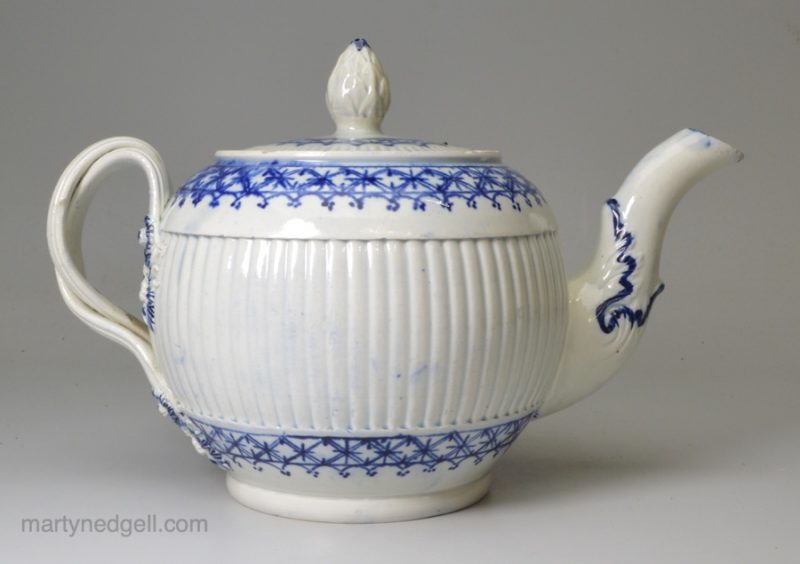 Pearlware pottery teapot decorated in blue under the glaze, circa 1780