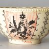 Creamware pottery 'Chintz' tea bowl and saucer, circa 1770