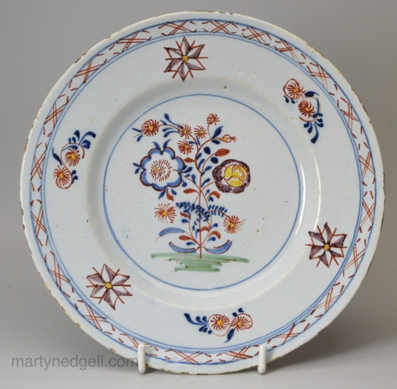 English delft polychrome plate, circa 1760, probably London