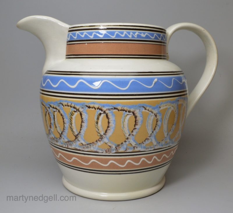 Large mocha ware jug on a pearlware pottery body, circa 1820