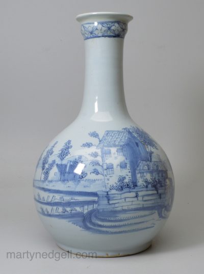 Liverpool delft water bottle, painted with a rural scene in blue, circa 1750