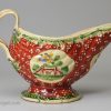 Creamware pottery sauce boat decorated with enamels over the glaze, circa 1770