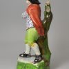 Staffordshire pearlware pottery figure of 'Winter', circa 1820