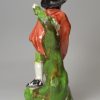 Staffordshire pearlware pottery figure of 'Winter', circa 1820