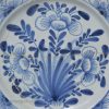 Damaged London delft charger, circa 1740