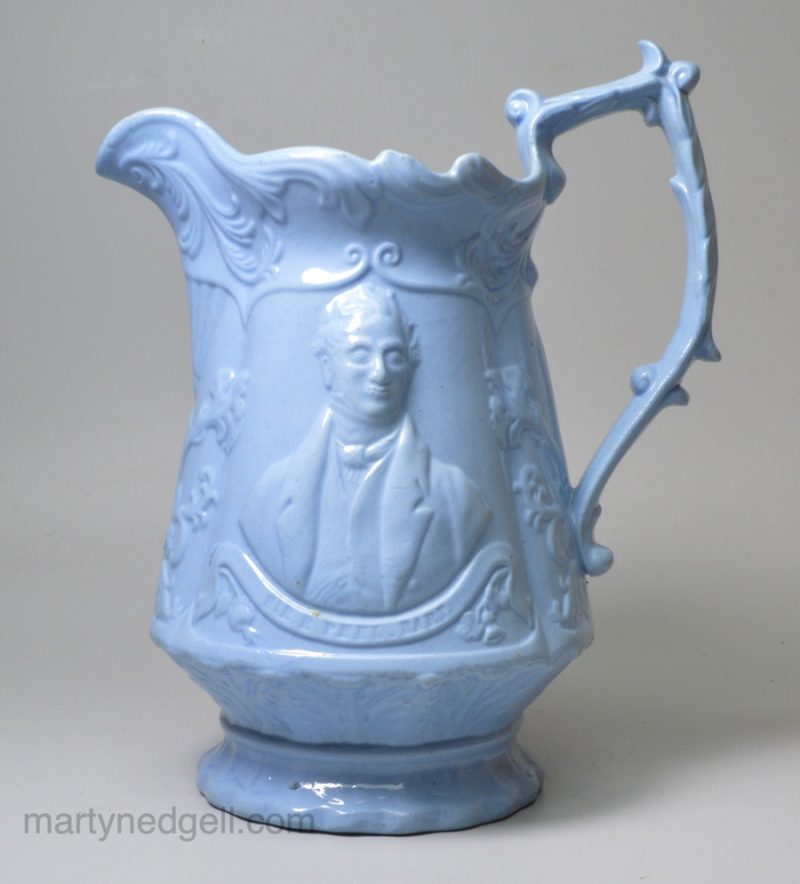 Blue pottery moulded commemorative jug with the MPs Peel and Cobden, circa 1850