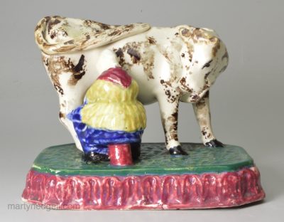 Scottish pearlware pottery cow and milk maid, circa 1820