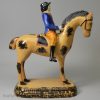 Yorkshire type prattware pottery horse and rider, circa 1820