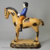 Yorkshire type prattware pottery horse and rider, circa 1820