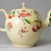 Creamware pottery teapot decorated with enamels over the glaze, circa 1770