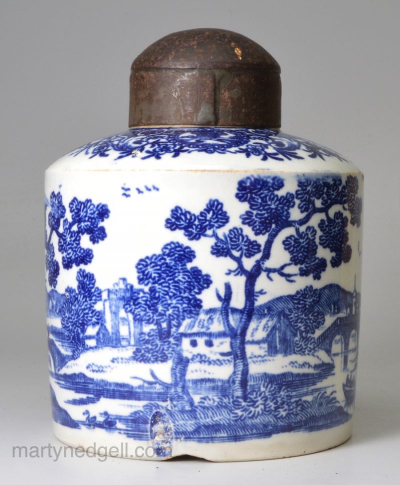 Pearlware pottery tea canister decorated with a blue transfer print under the glaze, circa 1800