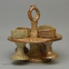 English brown saltglaze egg cup stand and four egg cups, circa 1840 Brampton Pottery