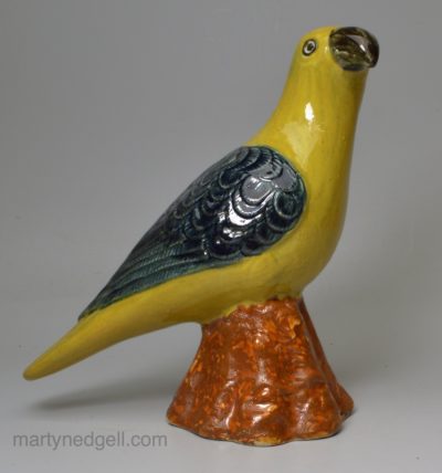 Pearlware pottery model of a parrot decorated with enamels under the glaze, circa 1800