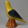 Pearlware pottery model of a parrot decorated with enamels under the glaze, circa 1800