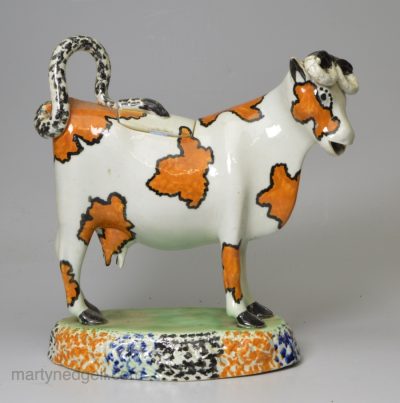 Yorkshire type prattware pottery cow creamer, circa 1820