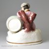 Prattware pottery spirit flask, moulded with classical themes, circa 1800