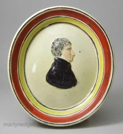 Creamware pottery plaque moulded with the profile of Lord John Russell, circa 1830