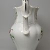 Pearlware pottery serving jug decorated with colours under the glaze, circa 1840