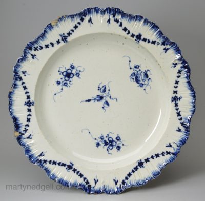 Pearlware pottery plate with shell edge and blue floral decoration under the glaze, circa 1790