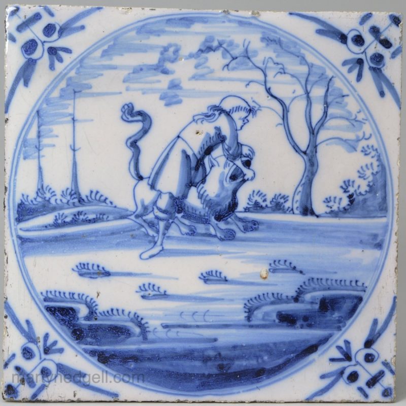 Dutch Delft Biblical tile, Samson killing the lion, circa 1740