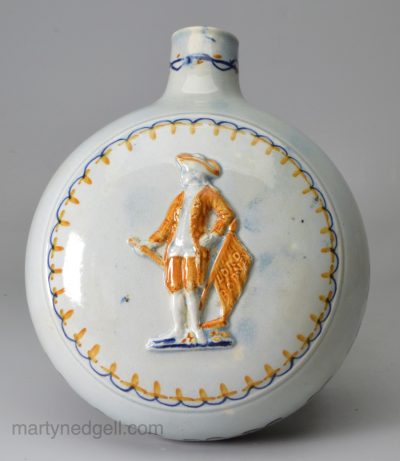 Prattware pottery commemorative flask moulded with the figure of Lord Rodney, circa 1795