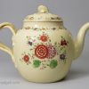 Creamware teapot decorated with enamels and gilding over the glaze, circa 1770