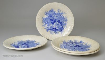 Set of four pearlware pottery cup plates decorated with blue transfer prints under the glaze, circa 1840