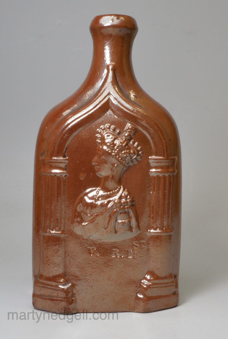 Derbyshire brown salt glaze stoneware commemorative flask, Queen Victoria and Prince Albert, circa 1850