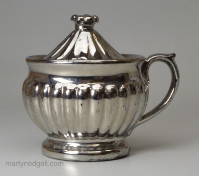 Silver lustre mustard pot and cover, circa 1840